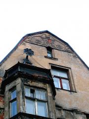 Ēkas fasādes fragments Rīgas ielā