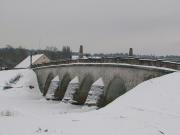 Akmens tilts ziemā